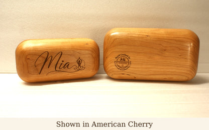 wo woodenblocks with engraved text on a plain background